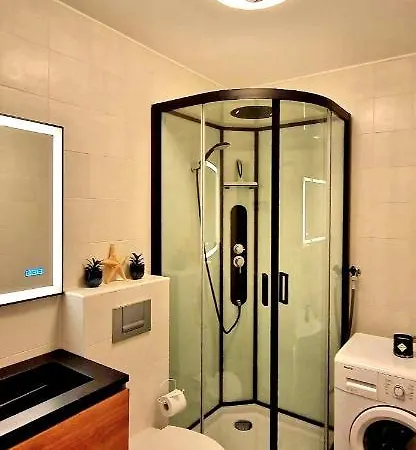 아파트 In Residentie Silverbeach Met Binnenzwembad 데한